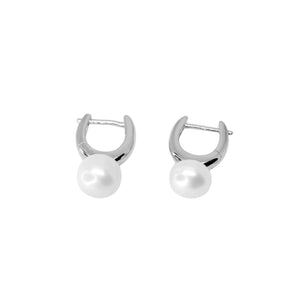 Timeless Pearl Huggie Earrings.