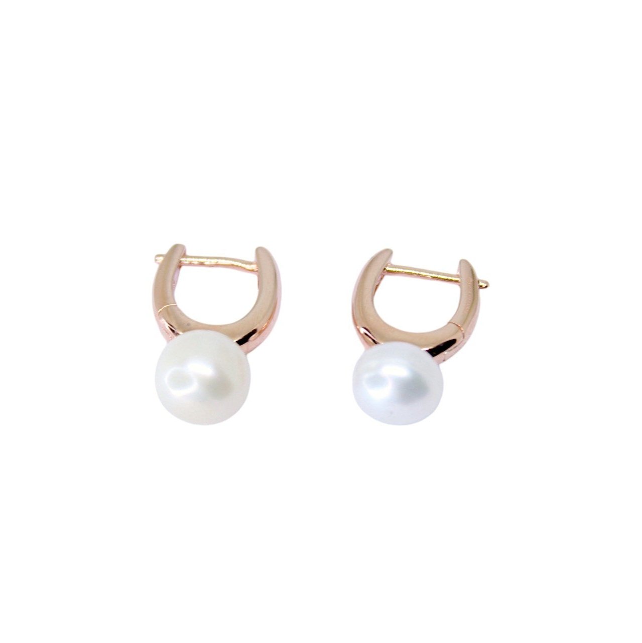 Timeless Pearl Huggie Earrings.