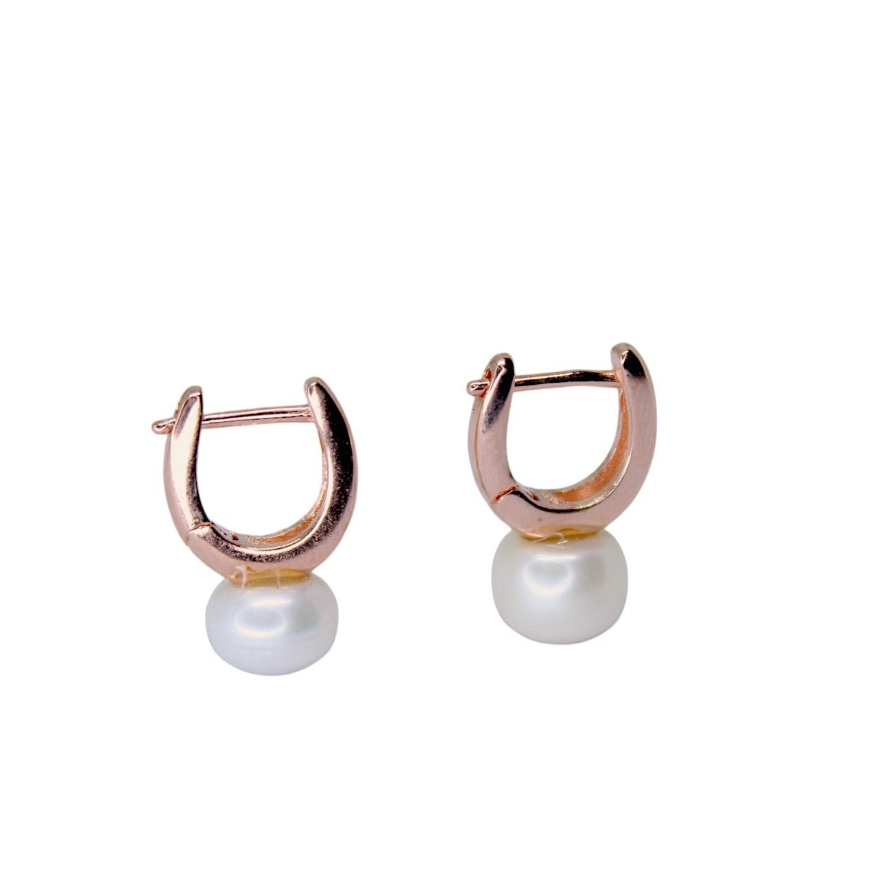 Timeless Pearl Huggie Earrings.