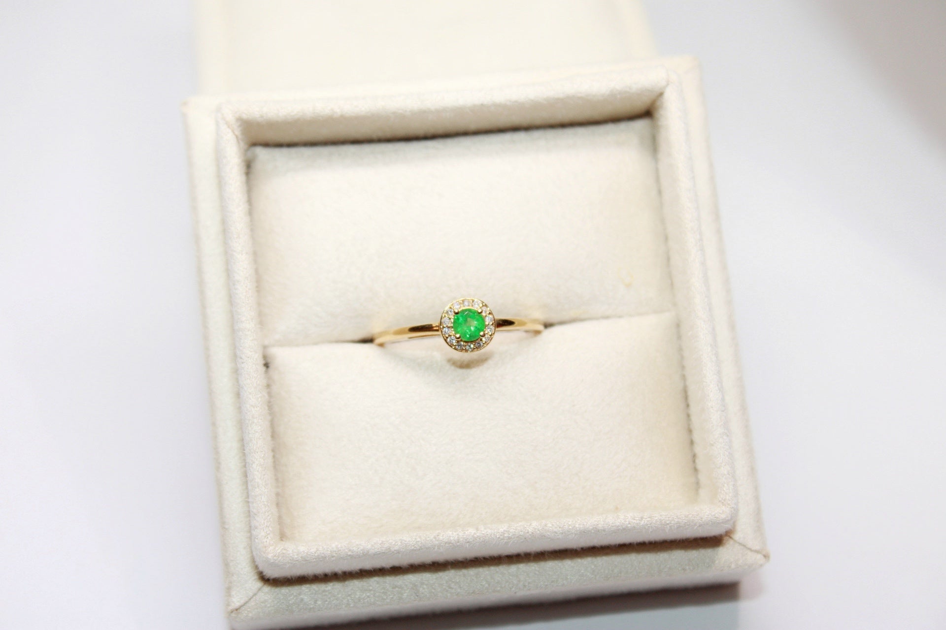 Emerald Engagement Ring with Diamond Halo