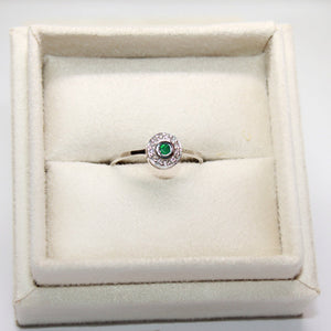 Emerald Engagement Ring with Diamond Halo in White Gold