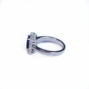 Lateral view sterling silver ring with blue cz 