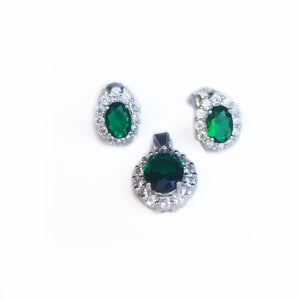 Juego de aretes y dije de plata con circonios verde esmeralda