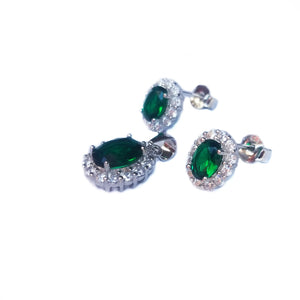 Juego de aretes y dije de plata con circonios verde esmeralda