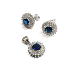Sterling silver earrings and pendant set in colores sapphire blue CZ