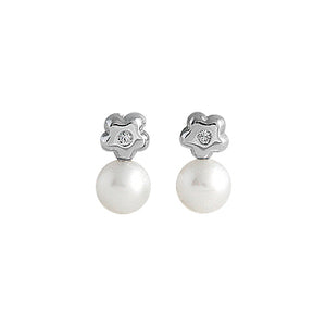 Cultured pearls and diamonds baby earrings.