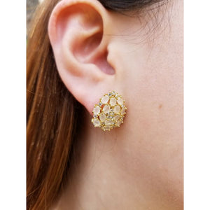 Woman with Oval pink crystal and zirconia earrings