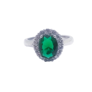 Beautiful sterling silver ring with emerald colored cz stone. 