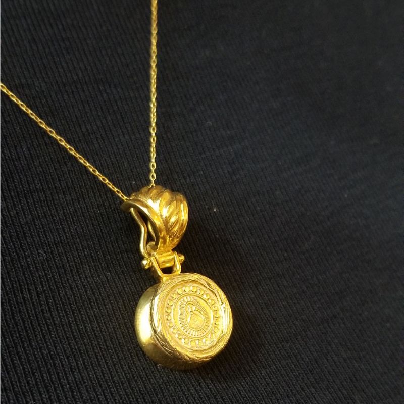 Virgin of Suyapa pendant and silver chain
